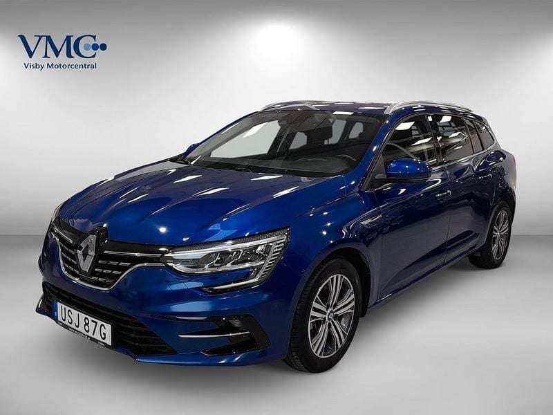 Blå (blå iron metallic rqh) Begagnad 2021 Renault Mégane IV Intens Kombi | 249 000 kr (Lite dyr) - Bild 1/3