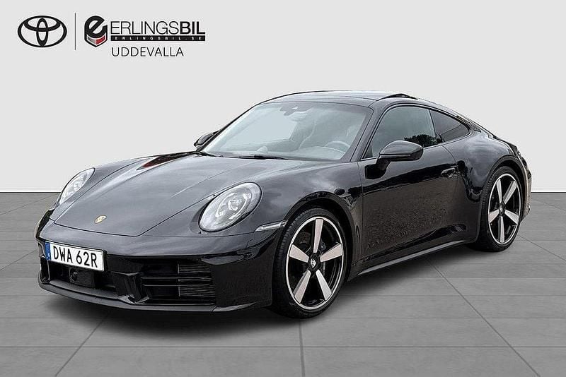 Svart Begagnad 2024 Porsche 911 Carrera Sportkupé | 1 599 000 kr - Bild 1/4