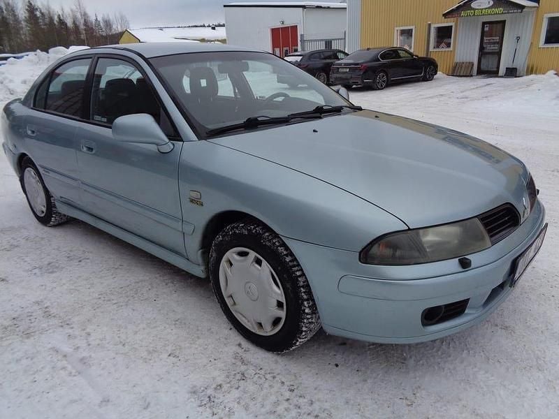 Begagnad Mitsubishi Carisma 122 HK (89 kW) 2003 Ljusgrönmetallic