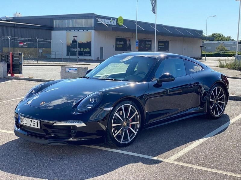 Svart Begagnad 2013 Porsche 911 Carrera 4S Sportkupé | 849 000 kr - Bild 1/4