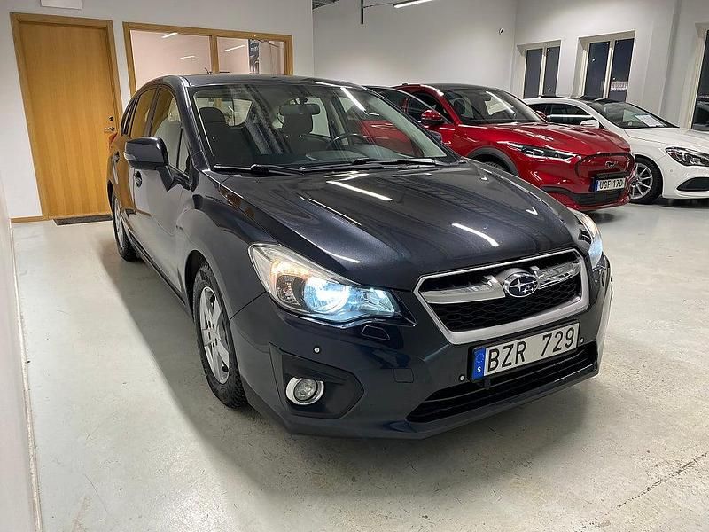 Begagnad Subaru Impreza 114 HK (83 kW) 2013 Mörkgrå Halvkombi