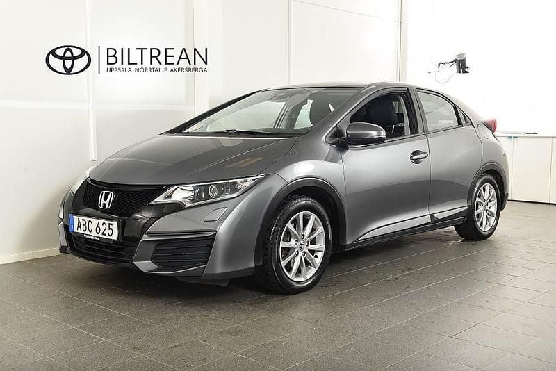 Grå metallic Begagnad 2015 Honda Civic Comfort Halvkombi | 114 900 kr (Superpris) - Bild 1/4