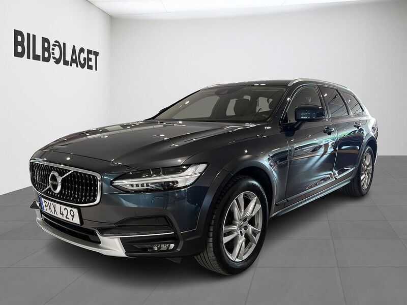 Mörkblå Begagnad 2017 Volvo V90 CC Business Edition Kombi | 269 800 kr (Marknadspris) - Bild 1/4