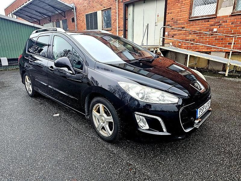 Begagnad Peugeot 308 SW 112 HK (82 kW) 2012 Svart Kombi