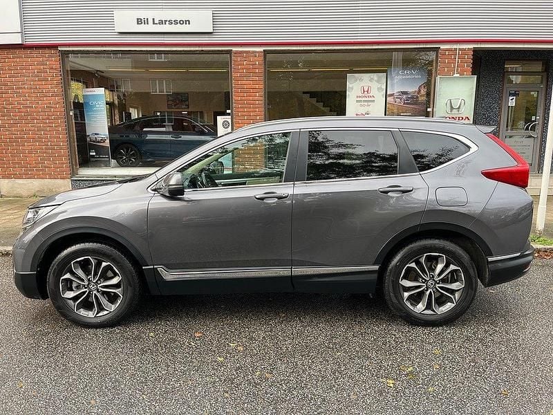 Ljusgrå Begagnad 2021 Honda CR-V Executive SUV | 339 000 kr - Bild 1/4
