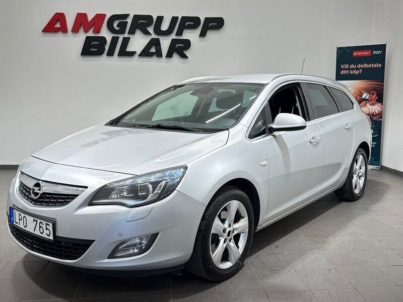 Grå Begagnad 2011 Opel Astra Enjoy Kombi | 39 900 kr (Marknadspris) - Bild 1/4
