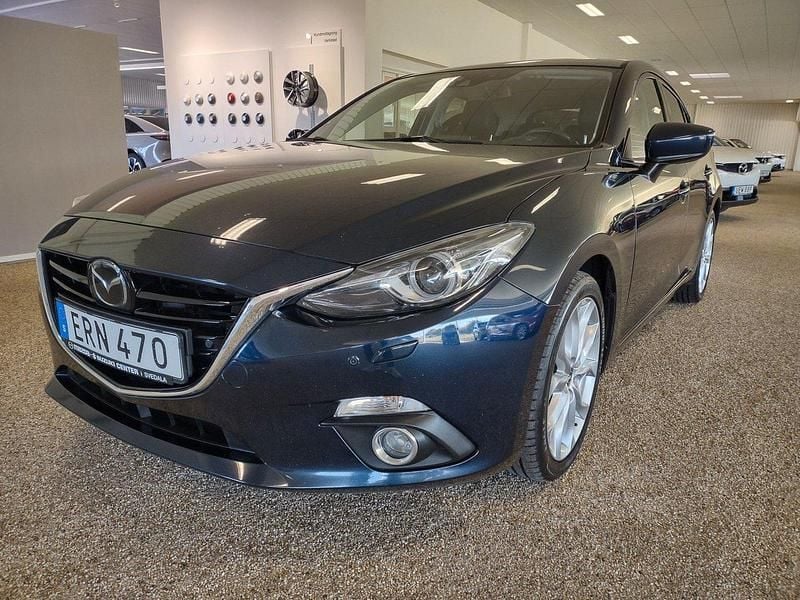Blå Begagnad 2016 Mazda 3 Optimum Halvkombi | 129 900 kr (Marknadspris) - Bild 1/4