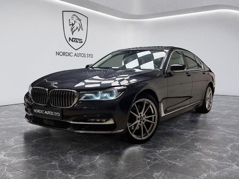 Mörkgrå Begagnad 2015 BMW 730 Executive Sedan | 319 900 kr (Bra pris) - Bild 1/4