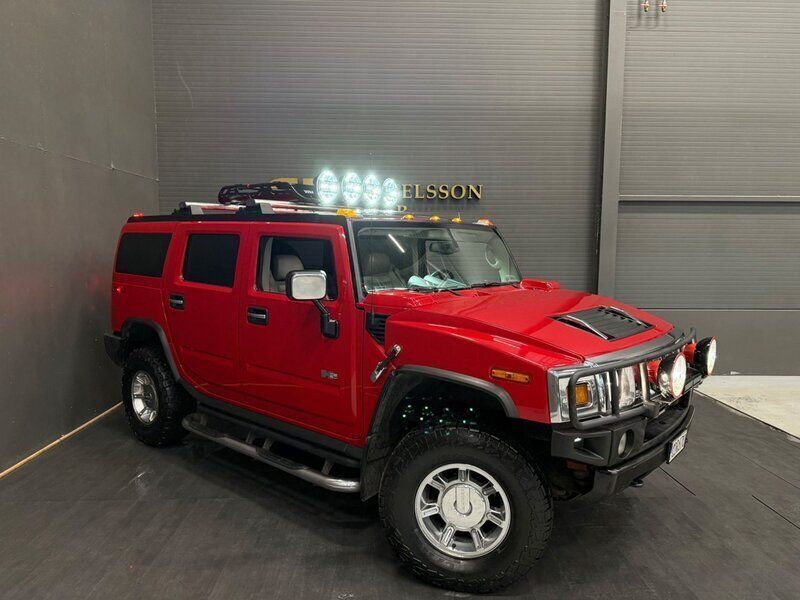 Röd Begagnad 2004 Hummer H2 SUV | 199 800 kr - Bild 1/4