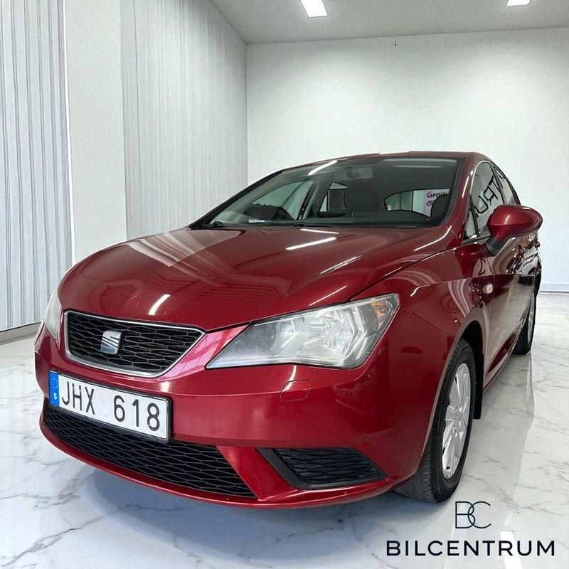 Mörkröd (röd) Begagnad 2014 Seat Ibiza Style Halvkombi | 59 900 kr (Marknadspris) - Bild 1/4