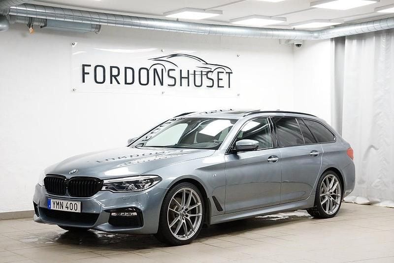 Mörkgrå Begagnad 2017 BMW 520 M Sport Kombi | 259 900 kr (Dyr) - Bild 1/4