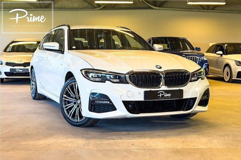 Vit Begagnad 2020 BMW 330e M Sport Kombi | 284 900 kr (Dyr) - Bild 1/4