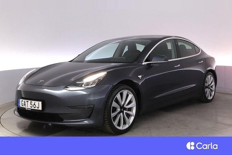 Grå Begagnad 2020 Tesla Model 3 Long Range AWD Sedan | 298 900 kr (Marknadspris) - Bild 1/3