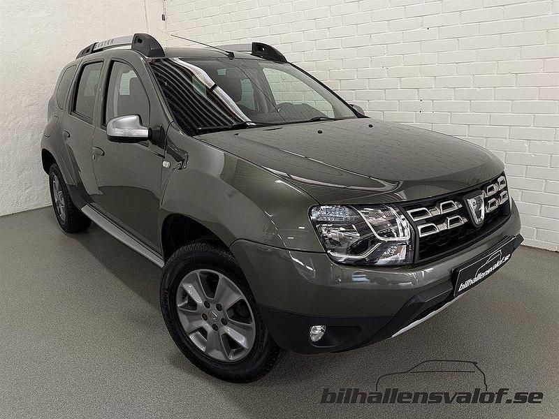 Grå Begagnad 2014 Dacia Duster Lauréate SUV | 89 900 kr (Marknadspris) - Bild 1/4