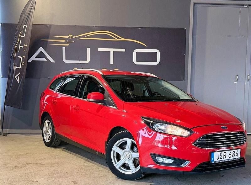 Röd Begagnad 2015 Ford Focus Titanium Kombi | 54 900 kr (Marknadspris) - Bild 1/4