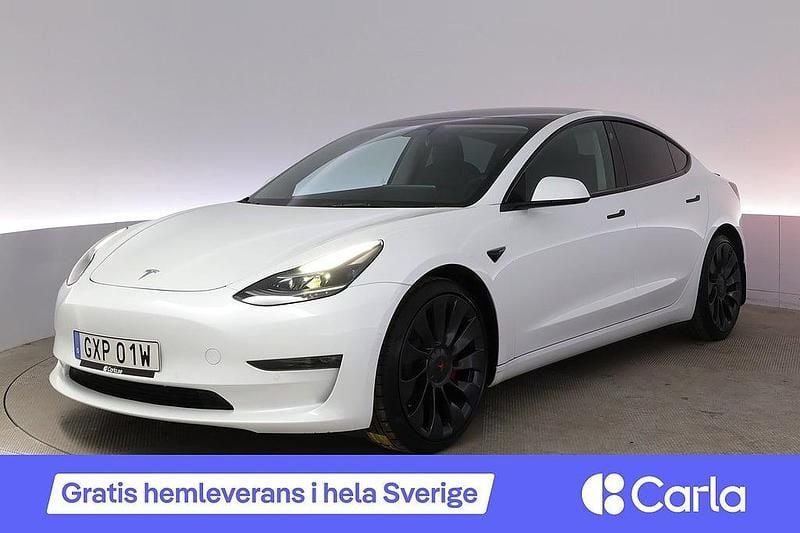 Vit Begagnad 2021 Tesla Model 3 Performance Sedan | 324 990 kr (Marknadspris) - Bild 1/4