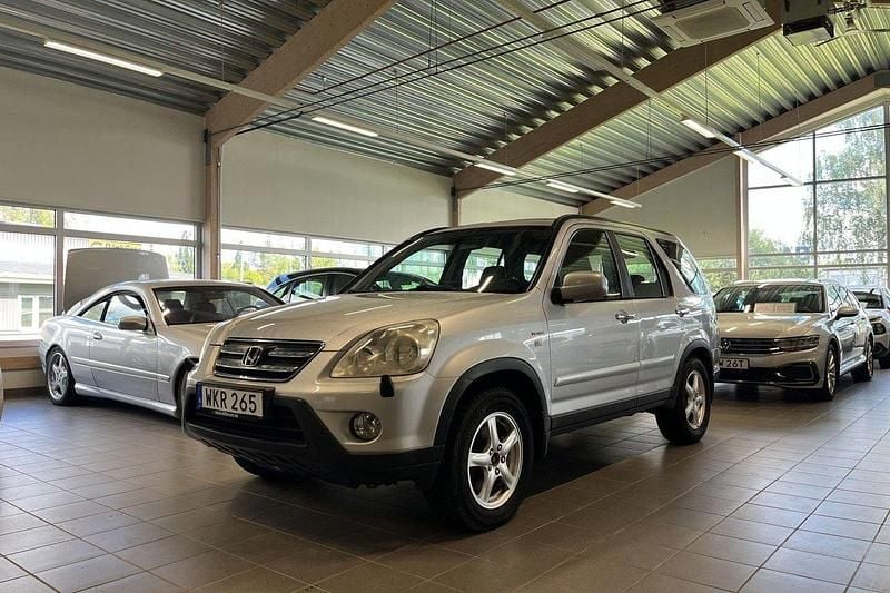 Silver Begagnad 2004 Honda CR-V SUV | 33 900 kr (Marknadspris) - Bild 1/4