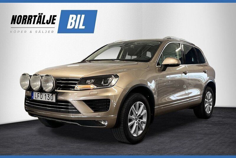 Ljusbrun (brun) Begagnad 2015 VW Touareg SUV | 189 900 kr (Marknadspris) - Bild 1/3