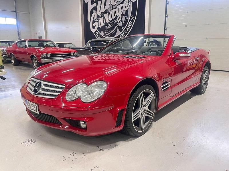 Röd (fire opal red) Begagnad 2006 Mercedes SL55 AMG AMG Cab | 445 000 kr - Bild 1/4