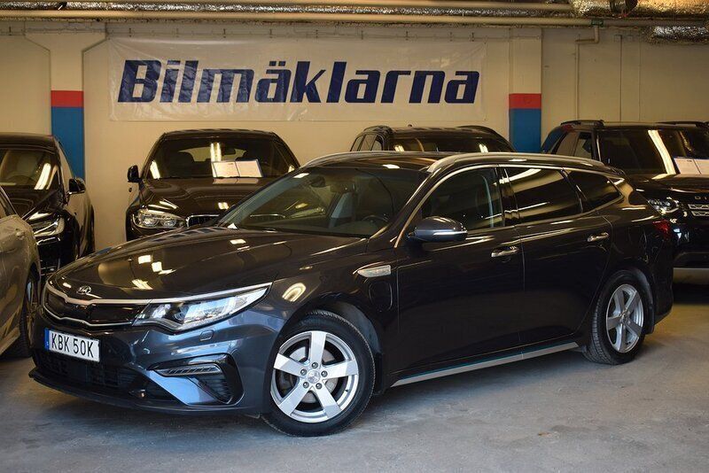 Grå Begagnad 2019 Kia Optima Hybrid 3 Sedan | 178 500 kr (Marknadspris) - Bild 1/4