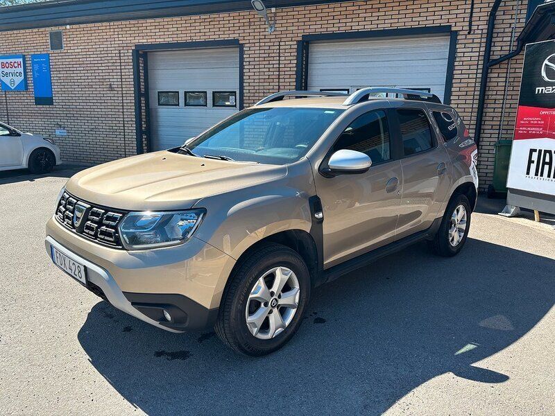 Ljusbrun (ljusbrun metallic) Begagnad 2018 Dacia Duster SUV | 104 900 kr (Marknadspris) - Bild 1/4
