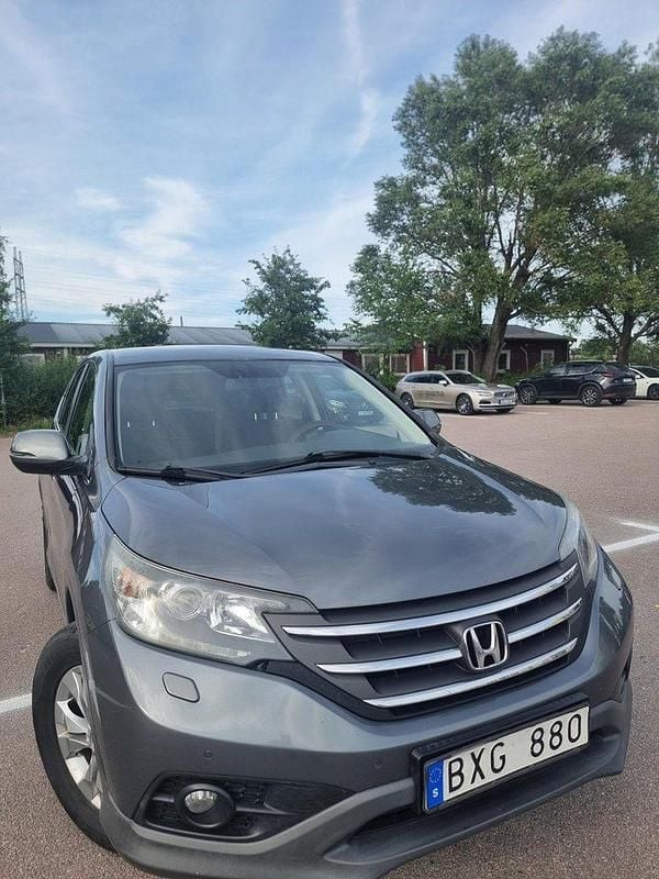 Grå Begagnad 2013 Honda CR-V Elegance SUV | 120 000 kr (Dyr) - Bild 1/4
