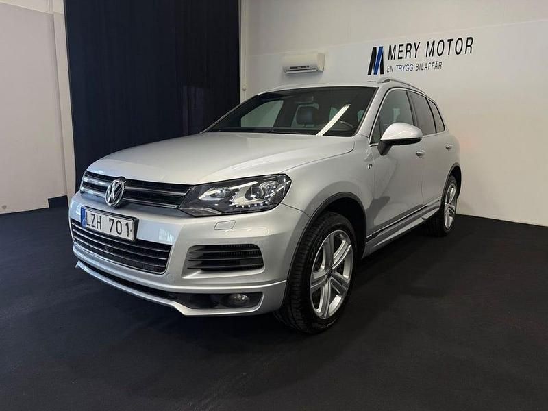 Silver Begagnad 2013 VW Touareg R-line SUV | 198 900 kr (Marknadspris) - Bild 1/4