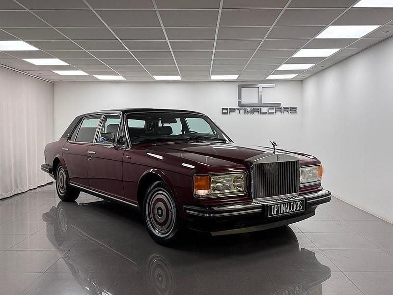 Mörkröd Begagnad 1988 Rolls Royce Silver Spur Sedan | 379 900 kr - Bild 1/4