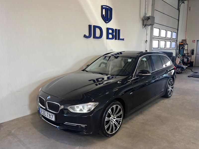 Svart Begagnad 2015 BMW 320 Luxury Line Kombi | 129 800 kr (Marknadspris) - Bild 1/4