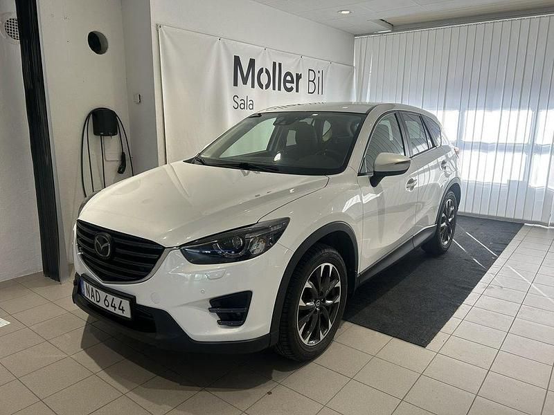 Vit Begagnad 2015 Mazda CX-5 SUV | 138 500 kr (Marknadspris) - Bild 1/4