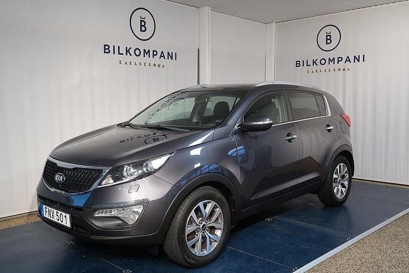 Grå Begagnad 2015 Kia Sportage SUV | 118 900 kr (Marknadspris) - Bild 1/4