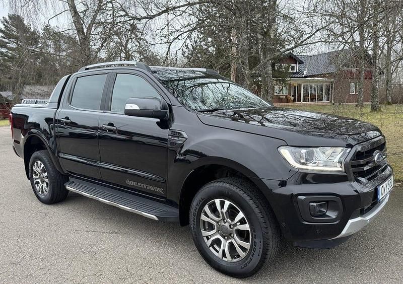 Svart Begagnad 2021 Ford Ranger Wildtrack Pickup | 435 000 kr (Marknadspris) - Bild 1/4