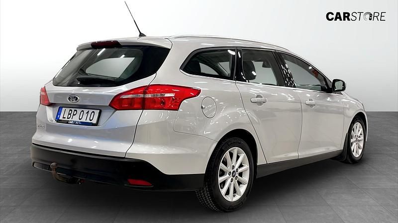 Begagnad Ford Focus Titanium 120 HK (88 kW) 2016 Grå Kombi