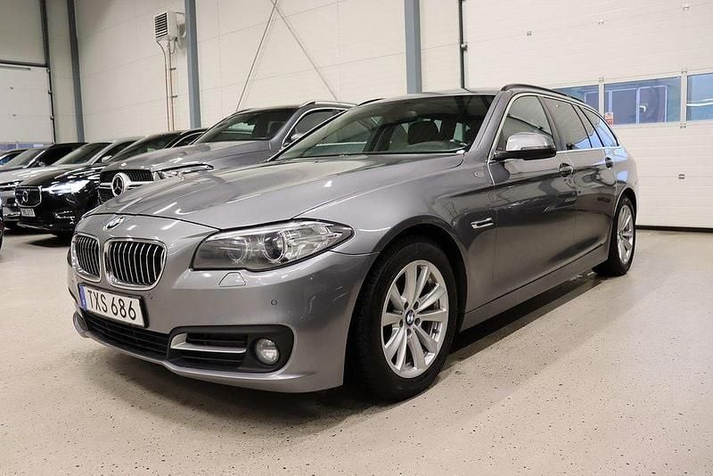 Grå Begagnad 2014 BMW 520 Kombi | 129 700 kr (Marknadspris) - Bild 1/4