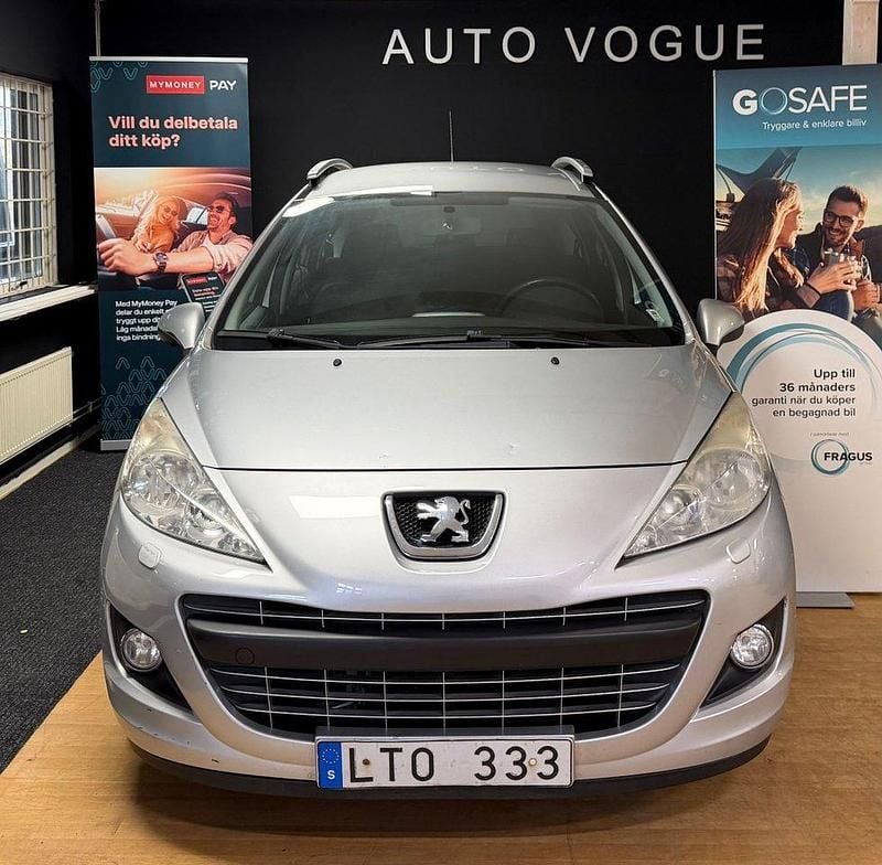 Ljusgrå (grå) Begagnad 2011 Peugeot 207 Kombi | 39 900 kr (Bra pris) - Bild 1/4