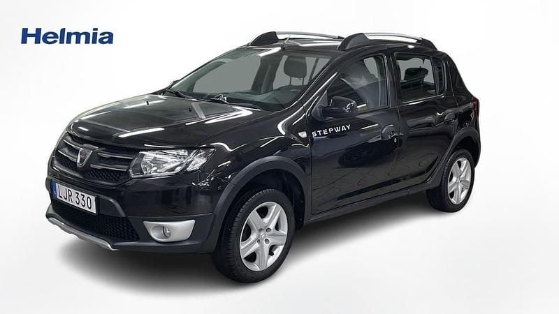 Svart Begagnad 2015 Dacia Sandero Prestige Halvkombi | 79 000 kr (Lite dyr) - Bild 1/4
