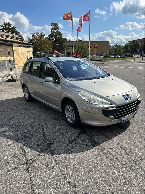 Grå Begagnad 2007 Peugeot 307 Kombi | 25 000 kr (Marknadspris) - Bild 1/4