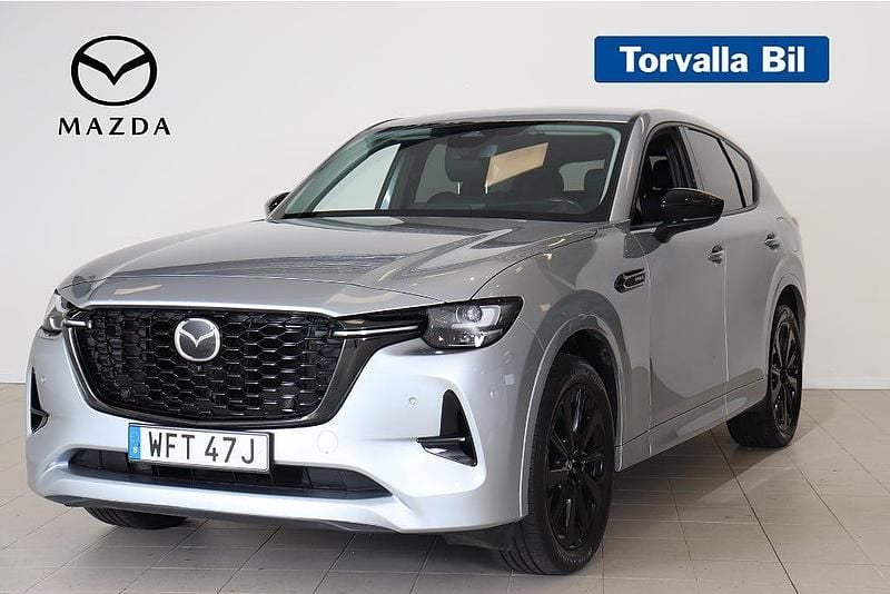 Grå Begagnad 2022 Mazda CX-60 Homura-Line SUV | 419 900 kr (Marknadspris) - Bild 1/4