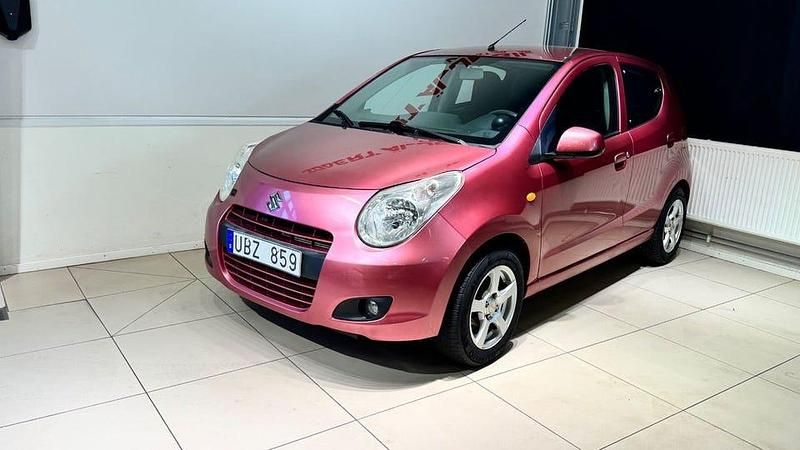 Begagnad Suzuki Alto 68 HK (50 kW) 2009 Ljusröd Halvkombi