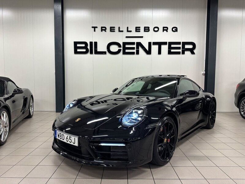 Svart Begagnad 2024 Porsche 911 Carrera S Sportkupé | 1 599 900 kr - Bild 1/4