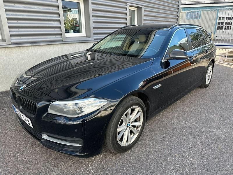 Svart Begagnad 2014 BMW 520 Kombi | 109 000 kr (Marknadspris) - Bild 1/4