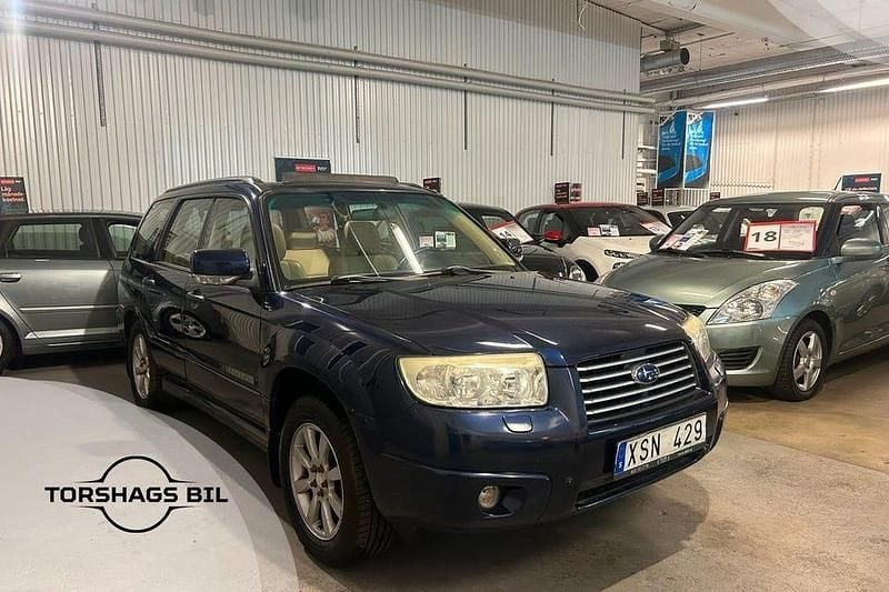 Mörkblå (blå) Begagnad 2006 Subaru Forester SUV | 49 900 kr (Marknadspris) - Bild 1/3