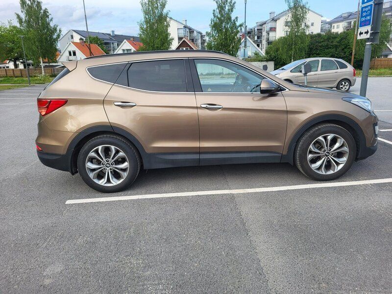 Brun Begagnad 2014 Hyundai Santa Fe Premium SUV | 147 000 kr (Bra pris) - Bild 1/4