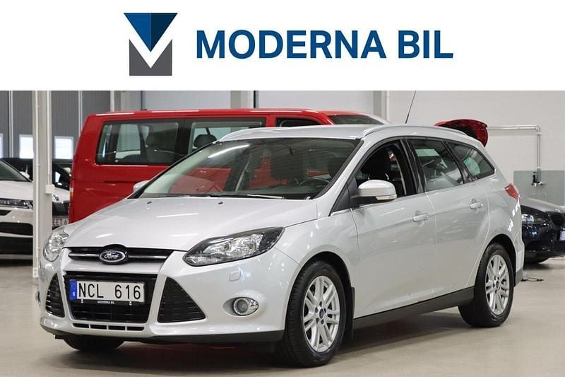 Grå Begagnad 2012 Ford Focus Titanium Kombi | 72 900 kr (Marknadspris) - Bild 1/4
