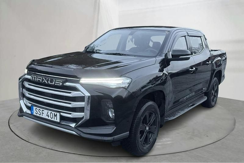 Svart Begagnad 2022 Maxus e-T90 Pickup | 300 000 kr (Marknadspris) - Bild 1/4