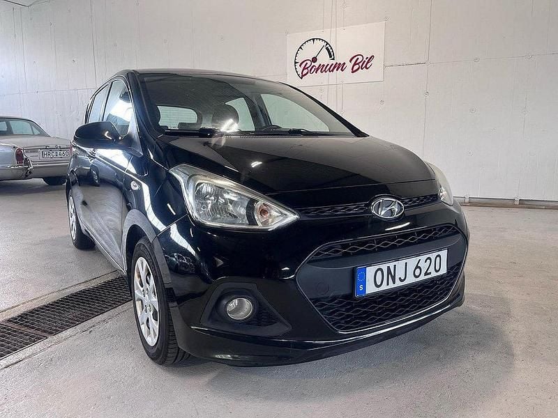 Svart Begagnad 2014 Hyundai i10 Halvkombi | 55 000 kr (Marknadspris) - Bild 1/4