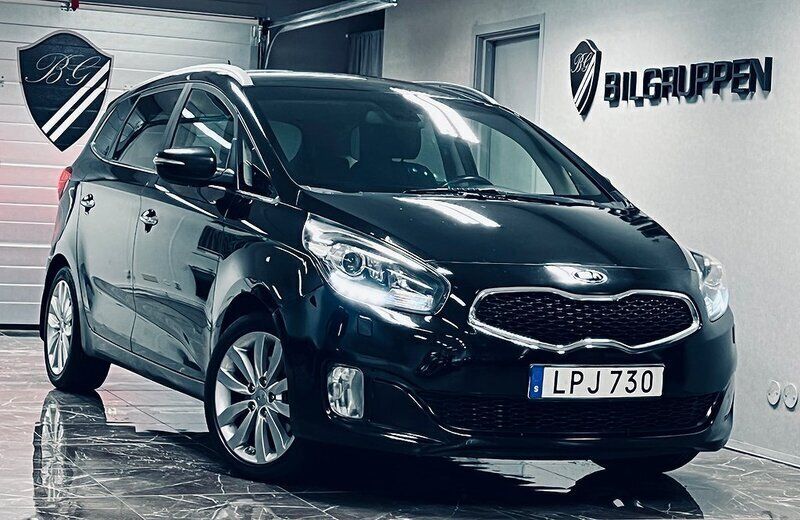Svart Begagnad 2014 Kia Carens 2 Minibuss | 79 900 kr (Marknadspris) - Bild 1/4