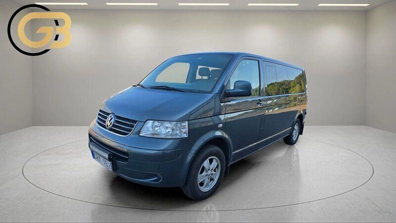 Mörkgrå (grå) Begagnad 2009 VW Caravelle Comfortline Minibuss | 97 900 kr (Marknadspris) - Bild 1/4