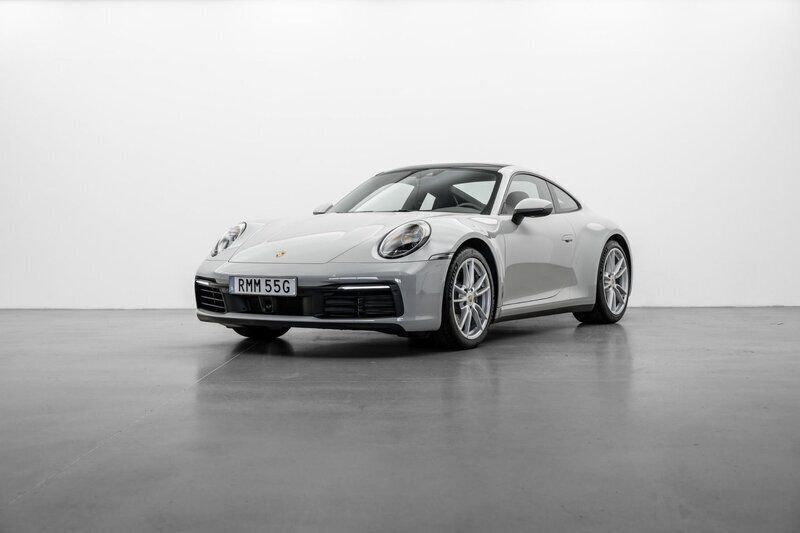 Ljusgrå Begagnad 2022 Porsche 911 Carrera Sportkupé | 1 299 000 kr - Bild 1/4