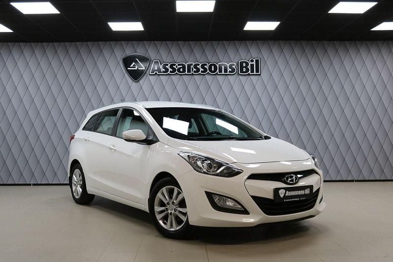 Vit Begagnad 2014 Hyundai i30 Kombi | 89 000 kr (Marknadspris) - Bild 1/4